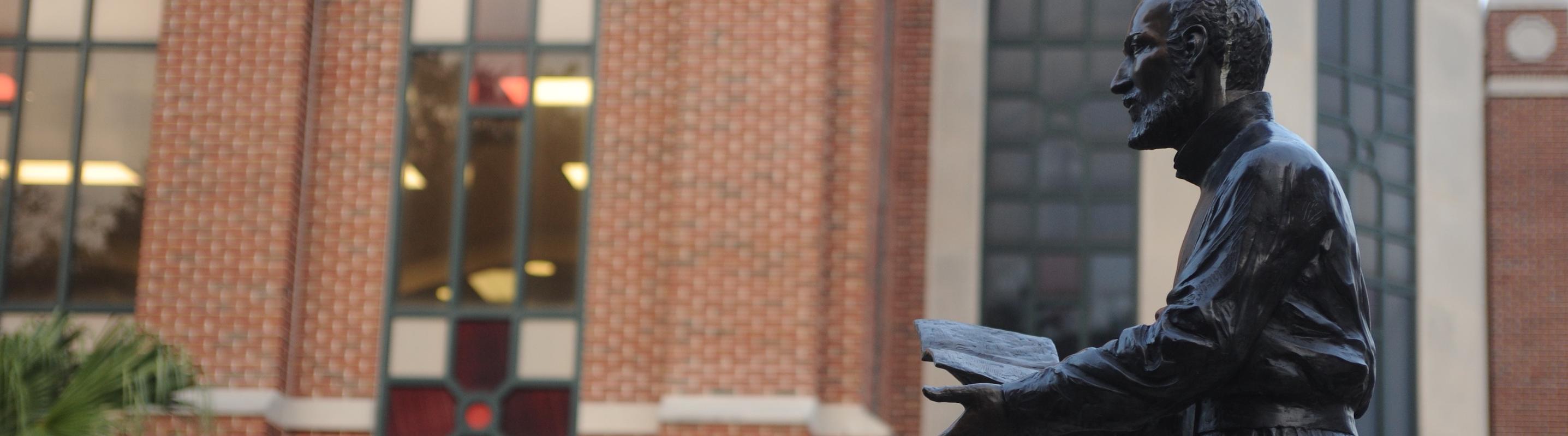 Ignatius Loyola In Front of Monroe Library